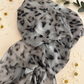 Grey cheetah animal print modal hijab with a grey and black spotted pattern by The M Essentials.