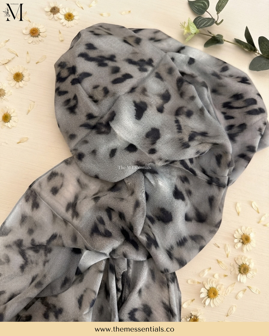 Grey cheetah animal print modal hijab with a grey and black spotted pattern by The M Essentials.