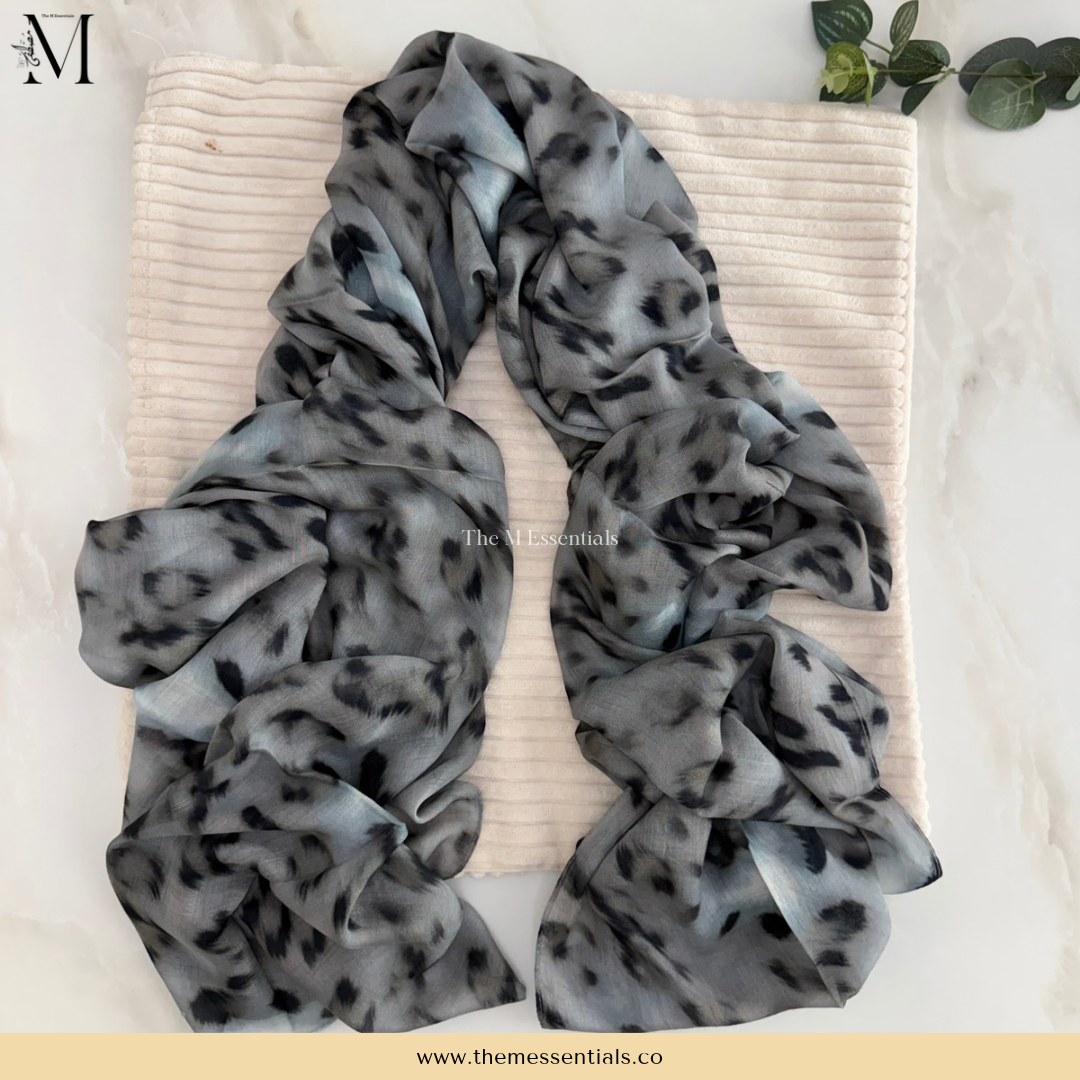 Grey cheetah animal print modal hijab with a grey and black spotted pattern by The M Essentials.