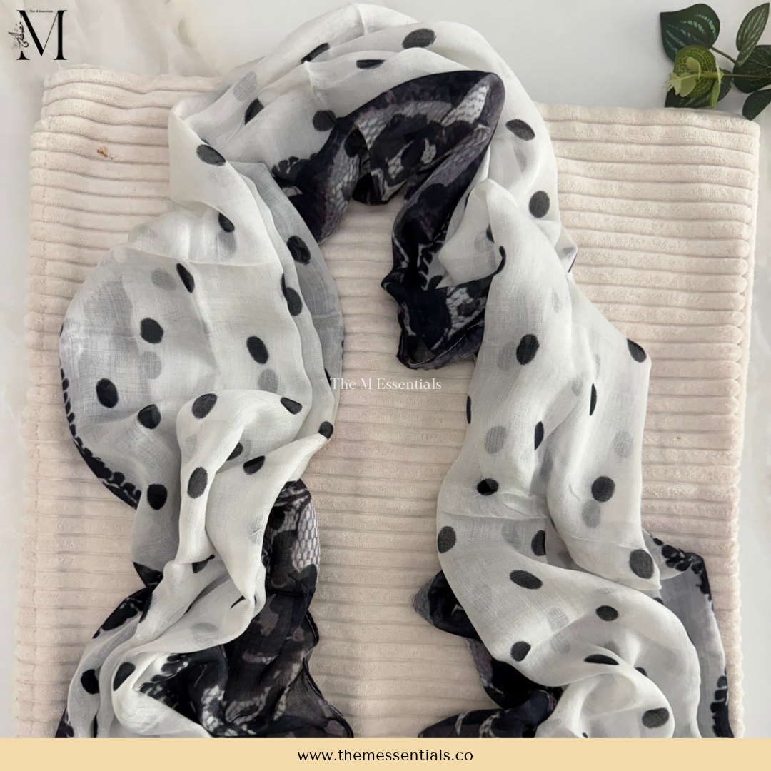 Polka dot printed modal hijab scarf by The M Essentials displayed in a flat lay.