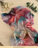 Watercolor-style printed modal hijab featuring an artistic paint-inspired pattern by The M Essentials.